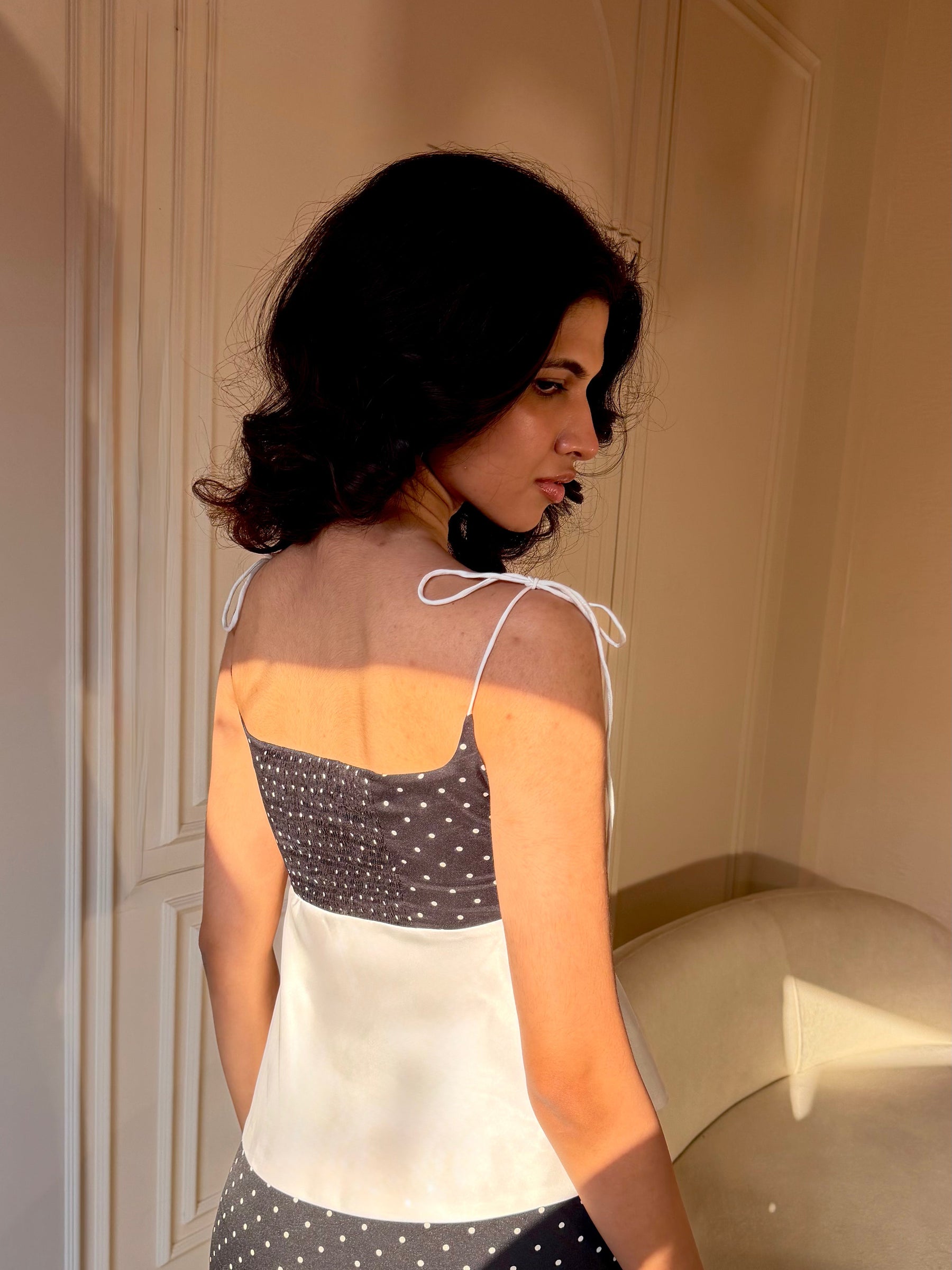 The Pretty Peplum Top - in Pitch Black