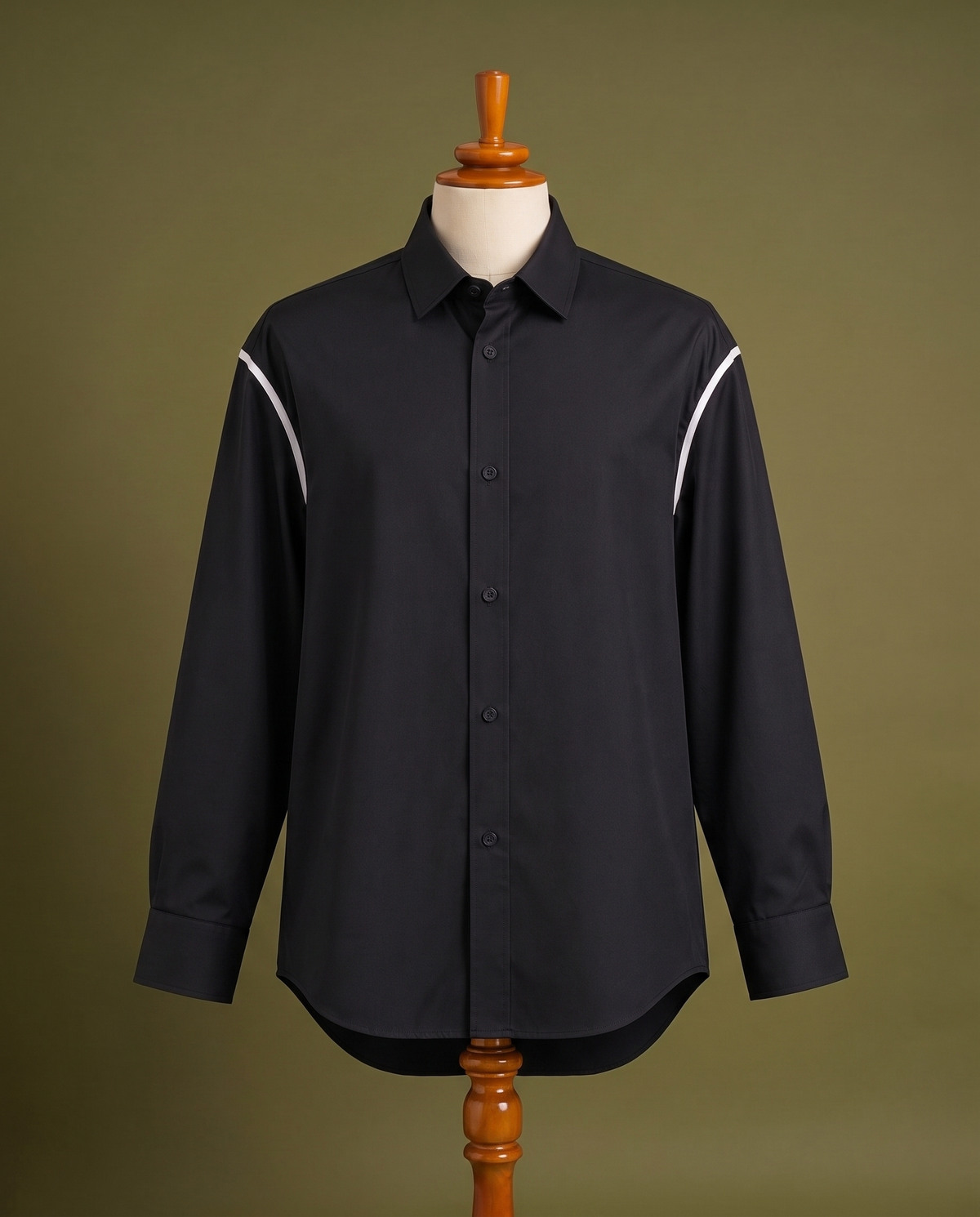 Black shirt with white contrast piping, front