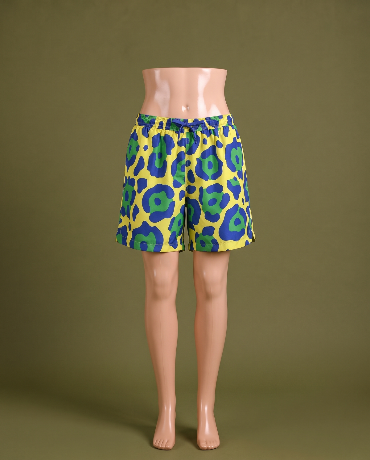 Yellow blue and green print shorts, front