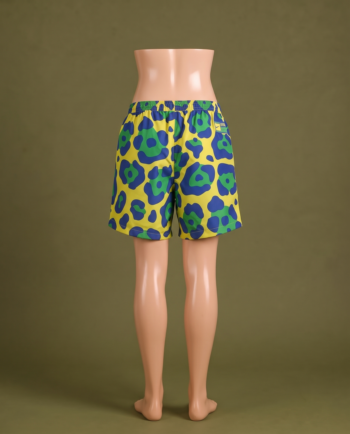 Yellow blue and green print shorts, back