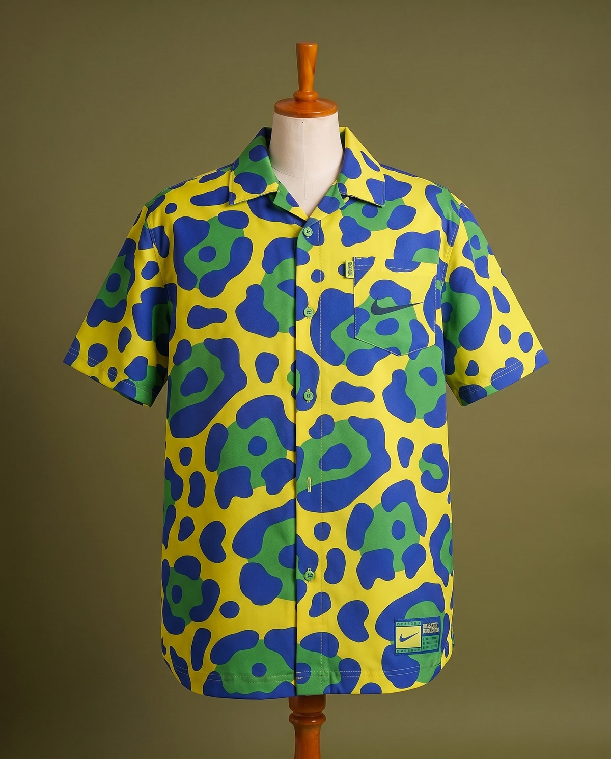 Yellow blue and green print short sleeve shirt, front